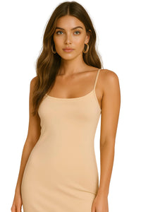 Thumbnail for Woman wearing a nude slip dress against a white background