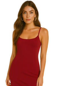 Thumbnail for Woman wearing a red slip dress against a white background