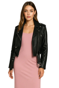 Thumbnail for Woman wearing a black leather jacket over a pink slip dress on a white background