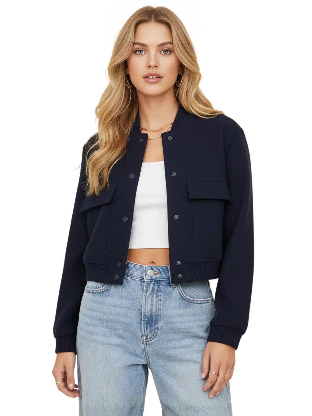 Woman wearing a navy blue jacket, white top, and light blue jeans on a white background