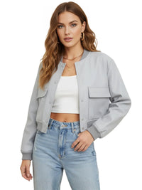 Thumbnail for Woman wearing a gray bomber jacket, white top, and blue jeans on a white background