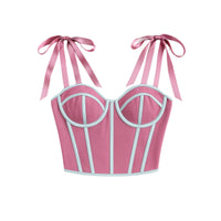 Thumbnail for Pink crop top with white straps and ribbon straps on a white background