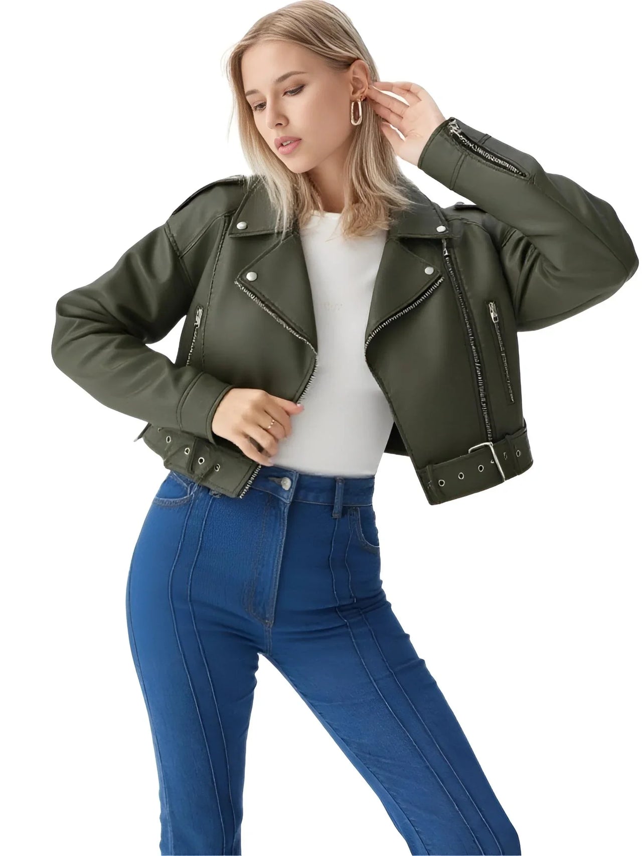 Woman wearing a green leather jacket and blue jeans on a white background