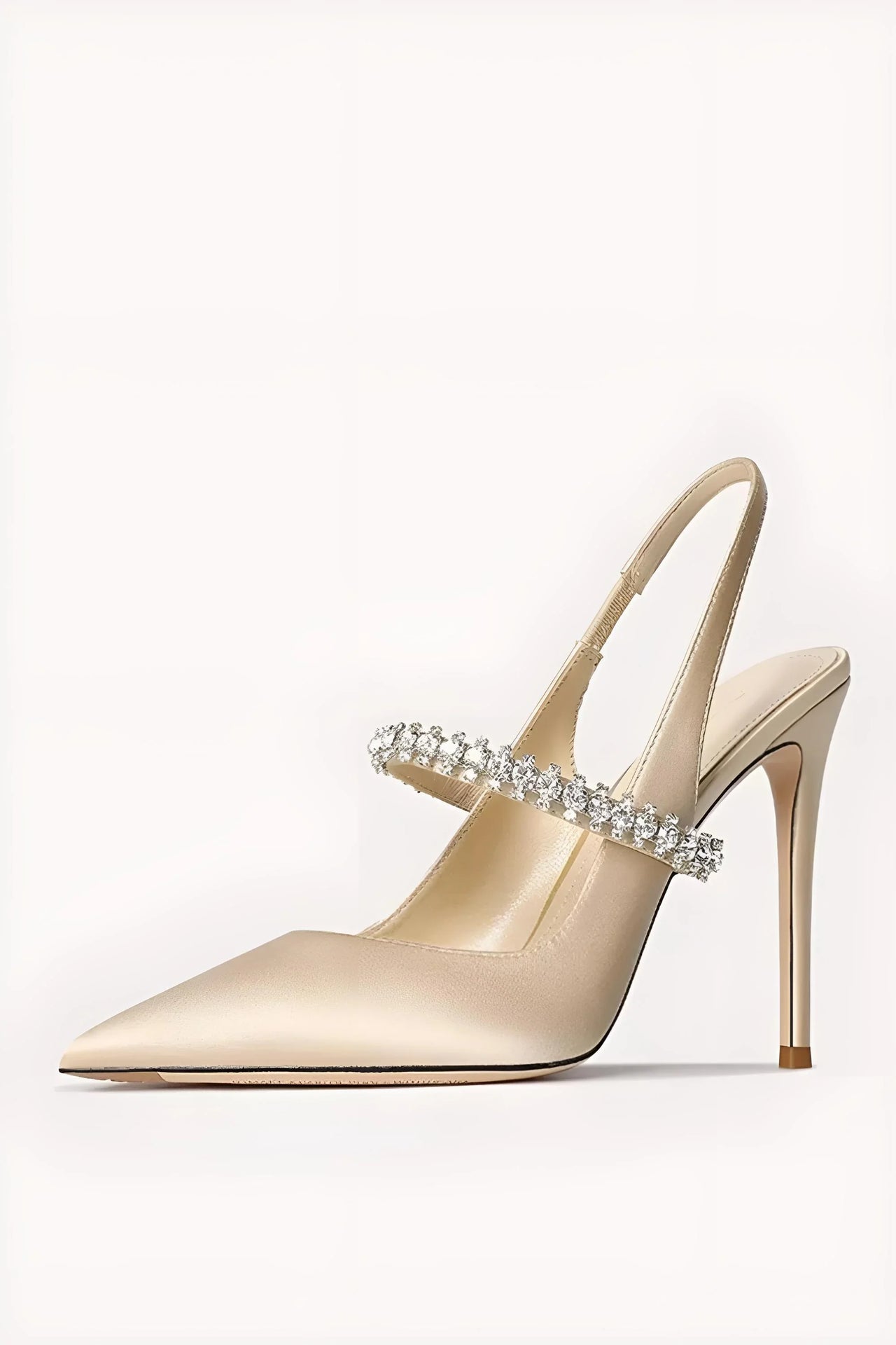 Women's high-heeled shoe with a decorative crystal strap on a white background