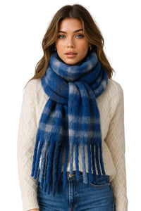 Thumbnail for Woman wearing a blue plaid scarf with a white sweater and jeans on a white background