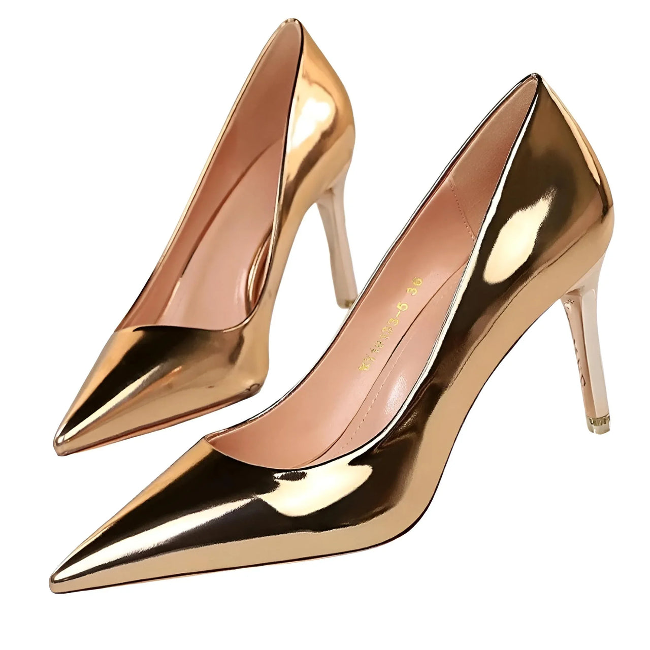 Pair of champagne high-heeled shoes on a white background