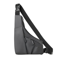 Thumbnail for Gray sling bag with a black strap on a white background