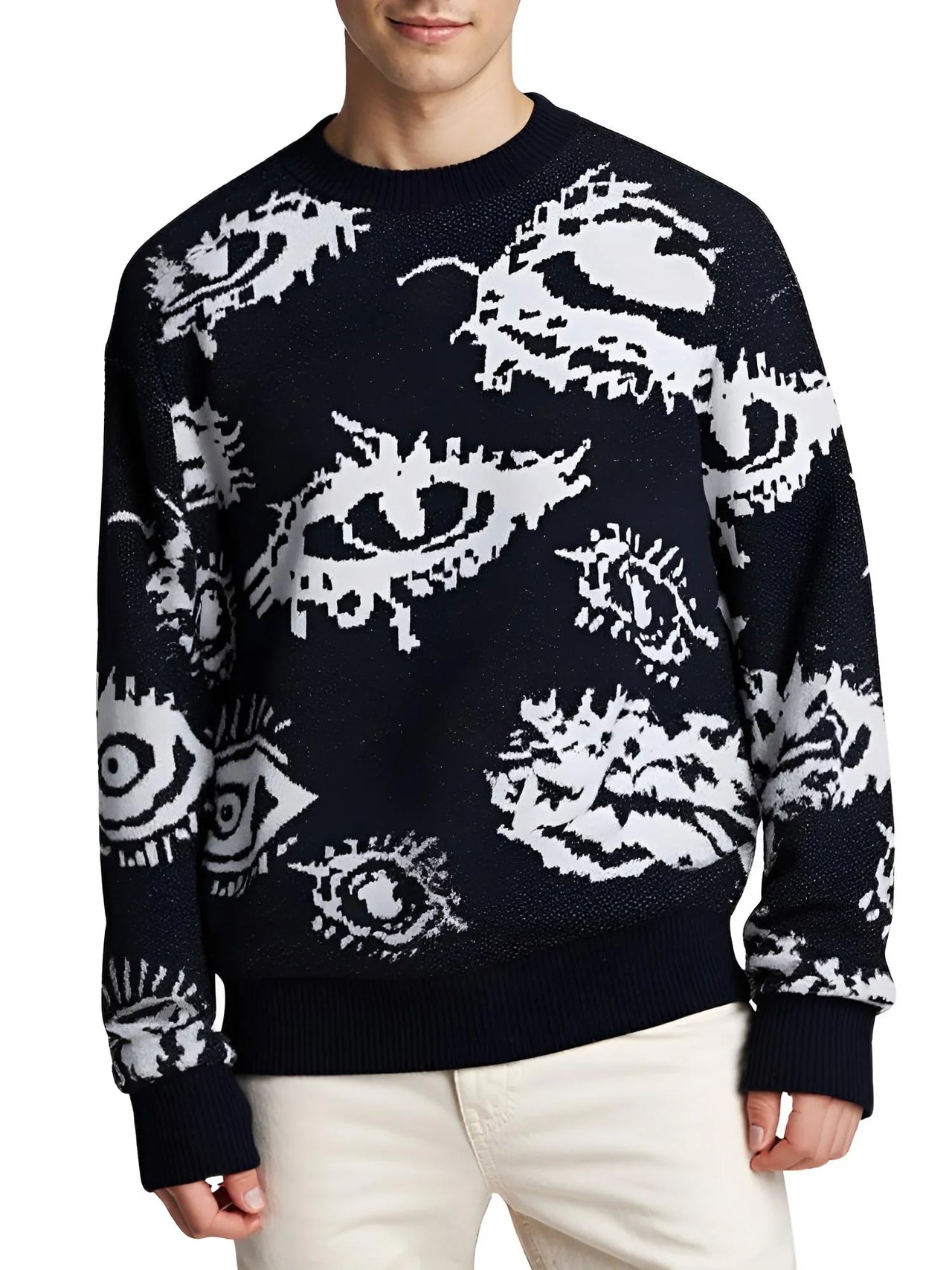 Black sweater with white eye pattern worn by a man on a white background