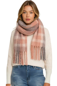 Thumbnail for Woman wearing a plaid scarf with a white sweater and blue jeans on a white background
