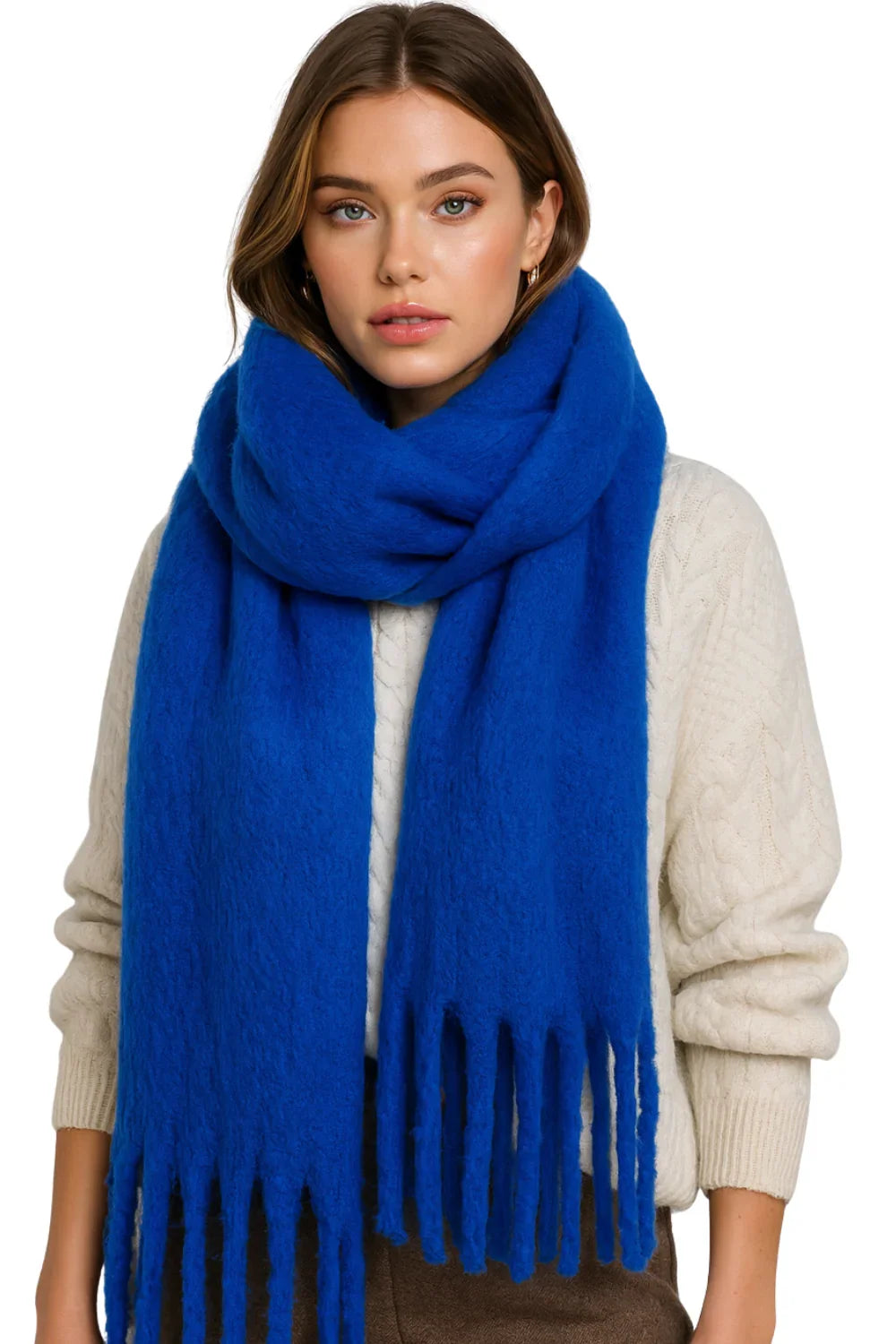 Woman wearing a blue scarf with a white background