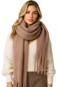 Thumbnail for Woman wearing a large brown blanket scarf on a white background
