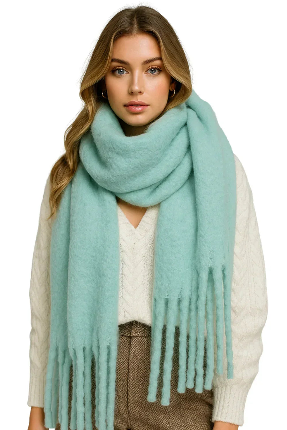 Woman wearing an ice cool blue scarf on a white background