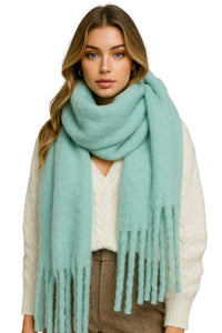 Thumbnail for Woman wearing an ice cool blue scarf on a white background