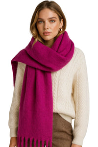 Thumbnail for Woman wearing a purple scarf with a white sweater and brown pants on a white background