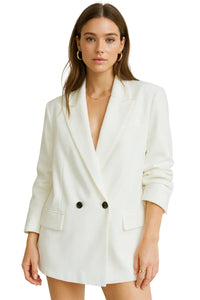 Thumbnail for Woman wearing a white blazer on a white background