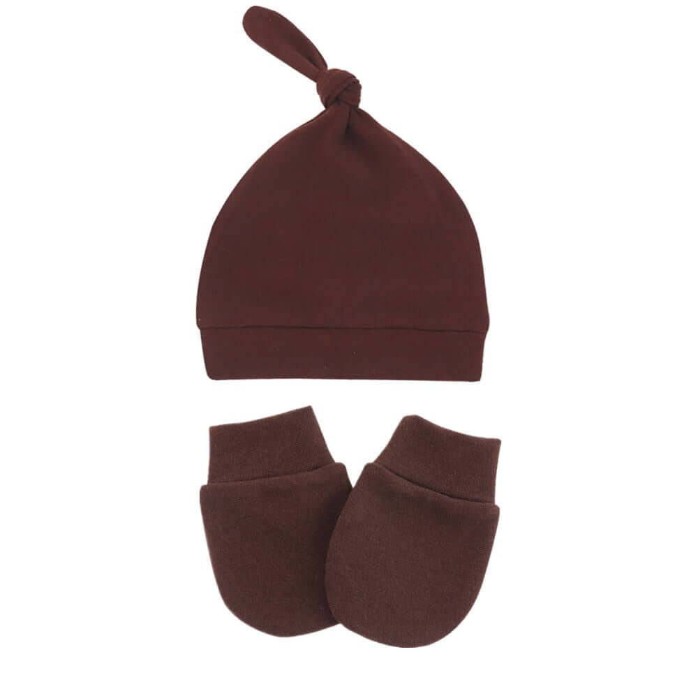 Cotton mitten and hat set for newborns. Mittens and hat are made of 100% cotton and have a delicate soft feel. Protect baby's delicate skin on hands and head.