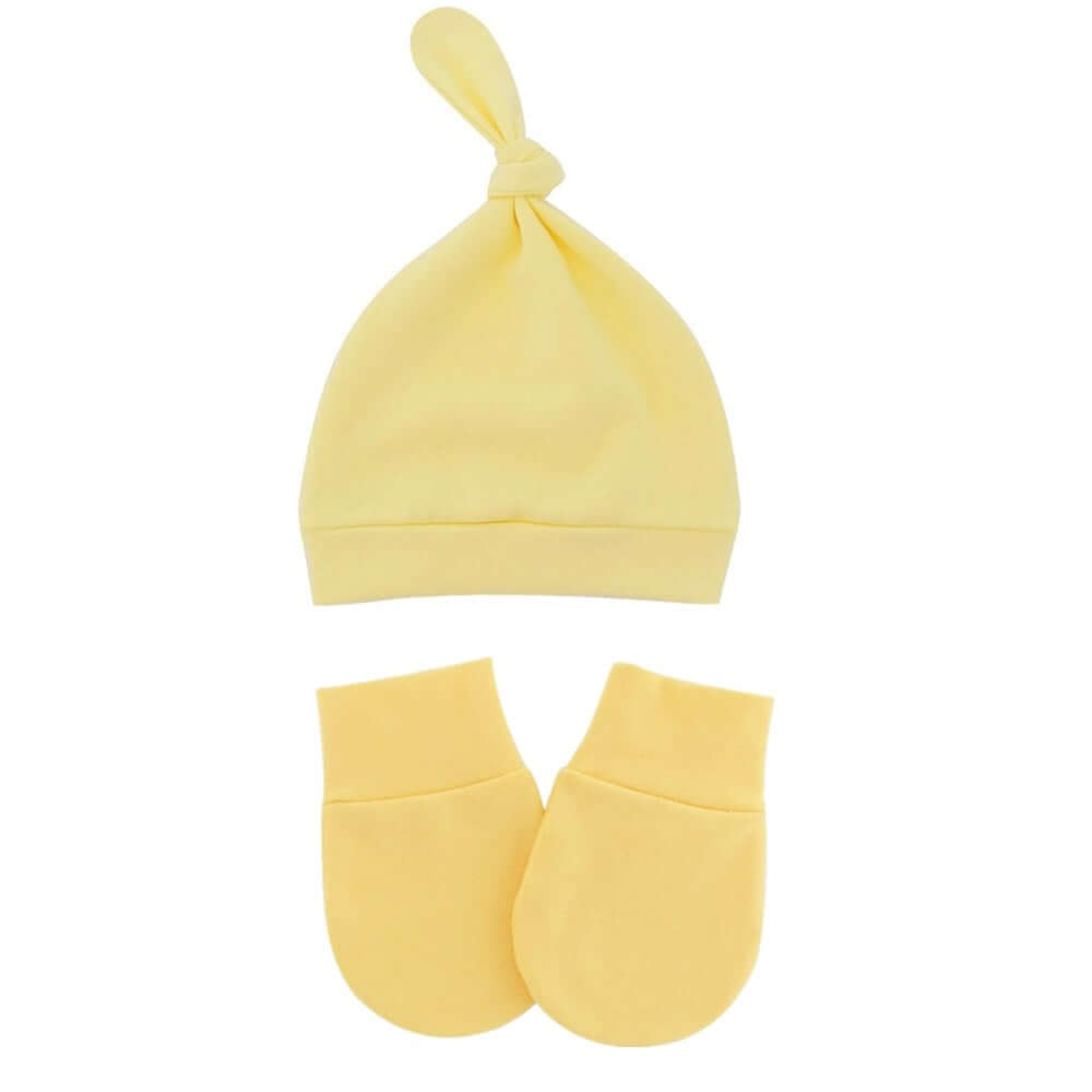 Cotton mitten and hat set for newborns. Mittens and hat are made of 100% cotton and have a delicate soft feel. Protect baby's delicate skin on hands and head.