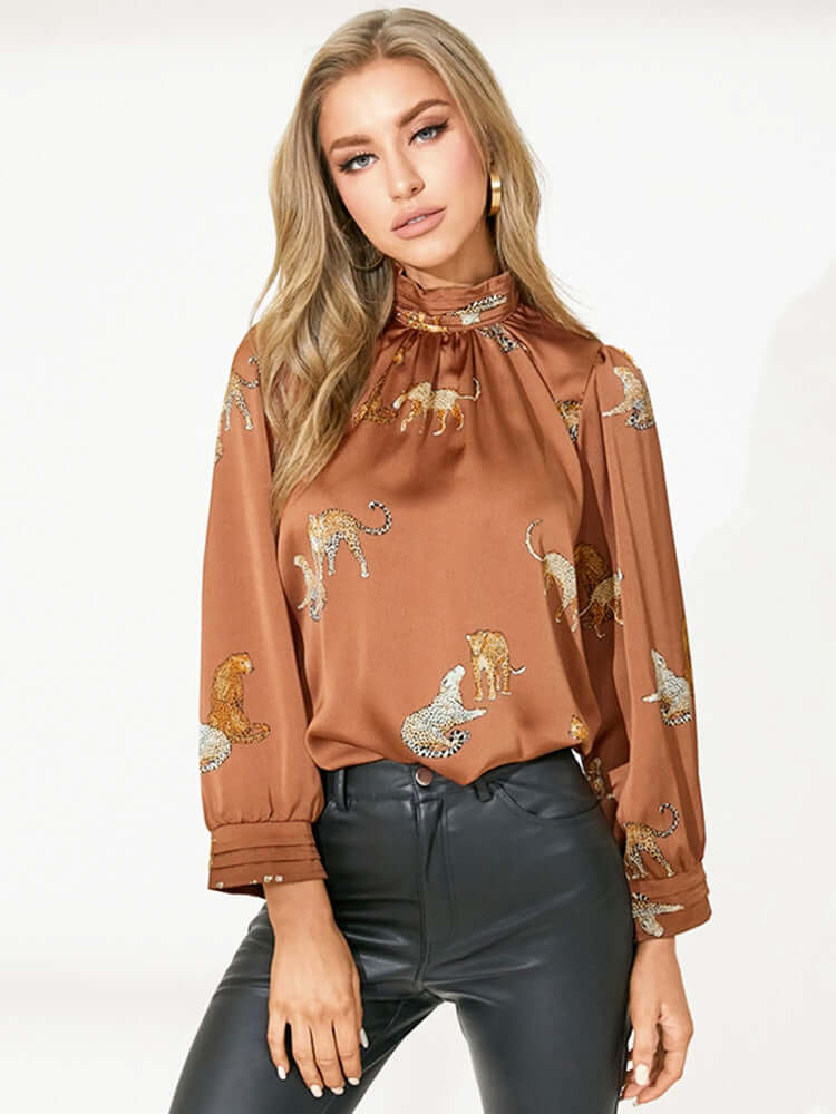 The easy elegance of this blouse will be perfect for a day at the office or a night out. The form-fitting silhouette will give you a polished look.