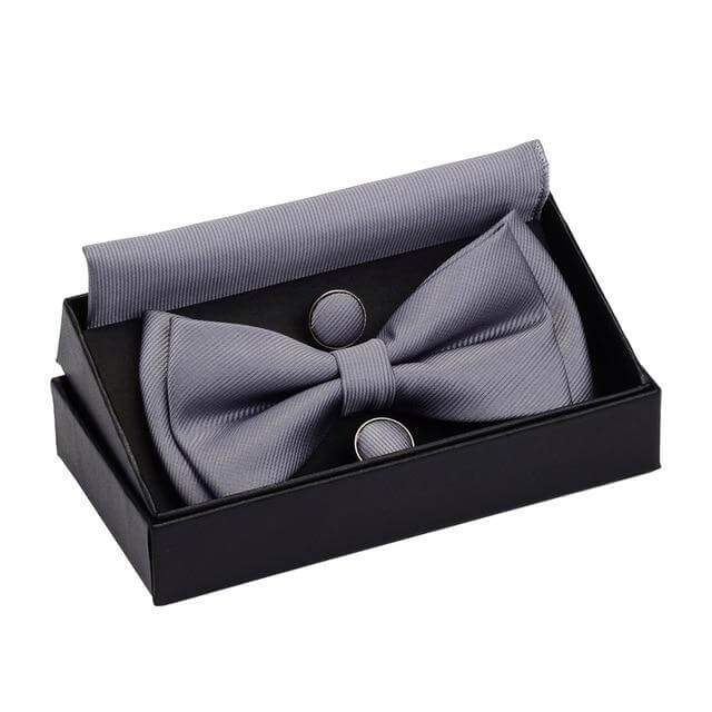 Get the perfect finishing touch for your outfit with this high-quality gray bow tie and cufflink set. It comes with a pocket square and a stylish box. Shop at Drestiny now and enjoy free shipping. We'll even cover the tax! Don't miss out on this limited-time o