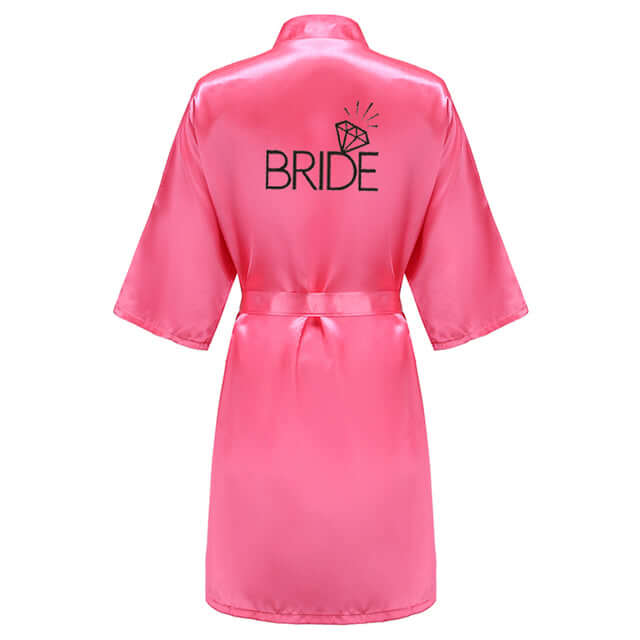 Elevate your wedding party with barbie pink satin kimono robes from Drestiny. Enjoy free shipping and tax covered. Limited time offer - save up to 50%!